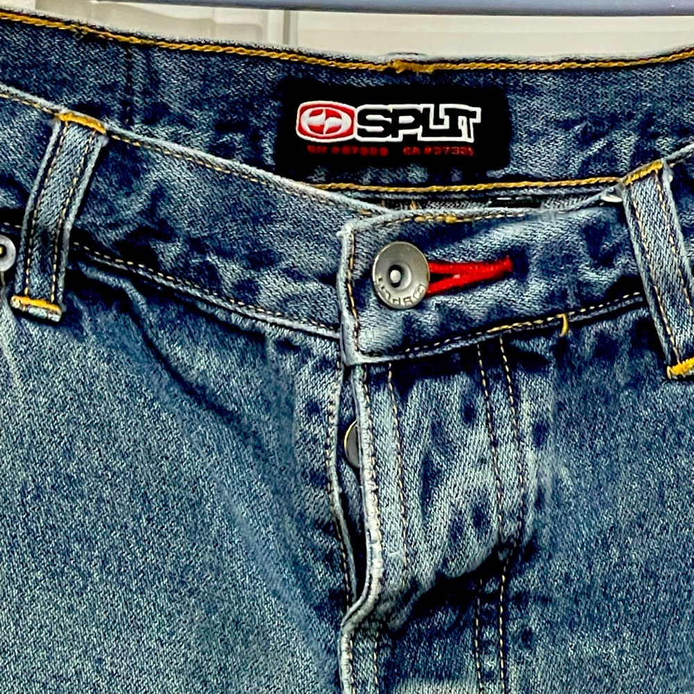 VINTAGE SPLIT SKATER JEANS. Unisex. Blue. Size 30. Waist 30”/Inseam 29”.